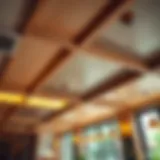 Elegant cafe ceiling design with wooden beams and ambient lighting