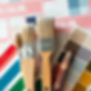 Close-up of paint brushes and color swatches ready for wall decoration