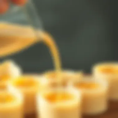 Candles being poured into molds