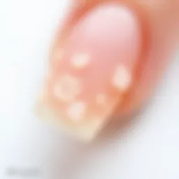 Close-up of artificial nails with adhesive residue