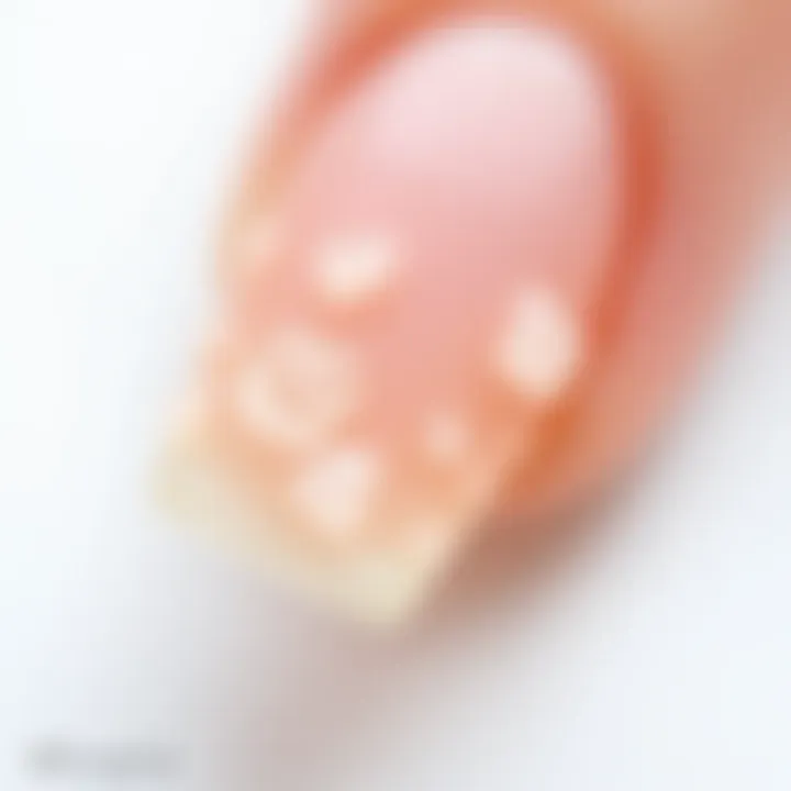 Close-up of artificial nails with adhesive residue