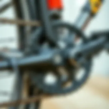 Close-up of a bicycle chain being aligned with gears