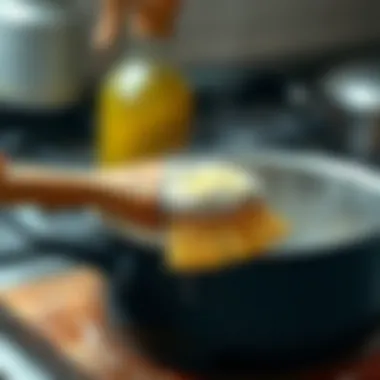 A scrub brush used to clean a burnt pot.